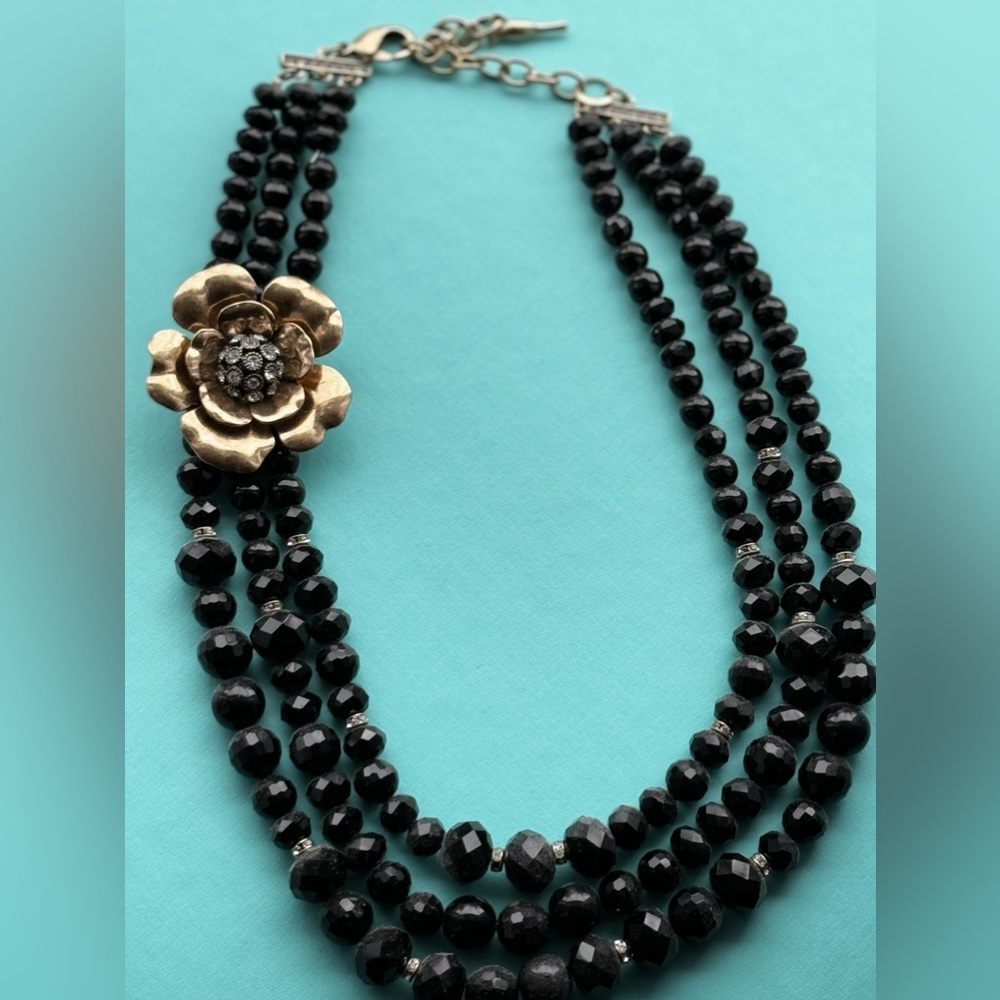 Gorgeous black beads with a removable floral brooch -18”